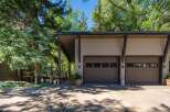 Discover the charm of this stunning property, featuring a modern garage with ample space for vehicles and storage.