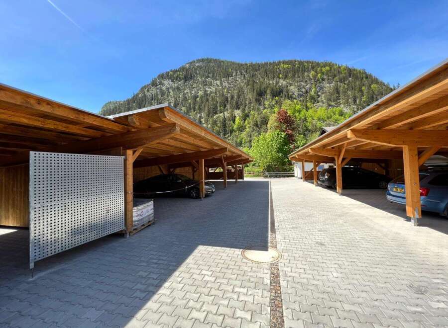 Discover the charm of this property featuring covered parking, perfect for protecting your vehicles from the elements.