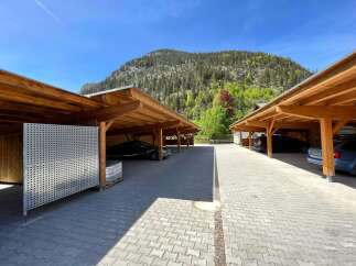 Discover the charm of this property featuring covered parking, perfect for protecting your vehicles from the elements.