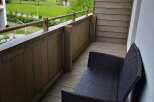 Enjoy breathtaking mountain views from this charming balcony.