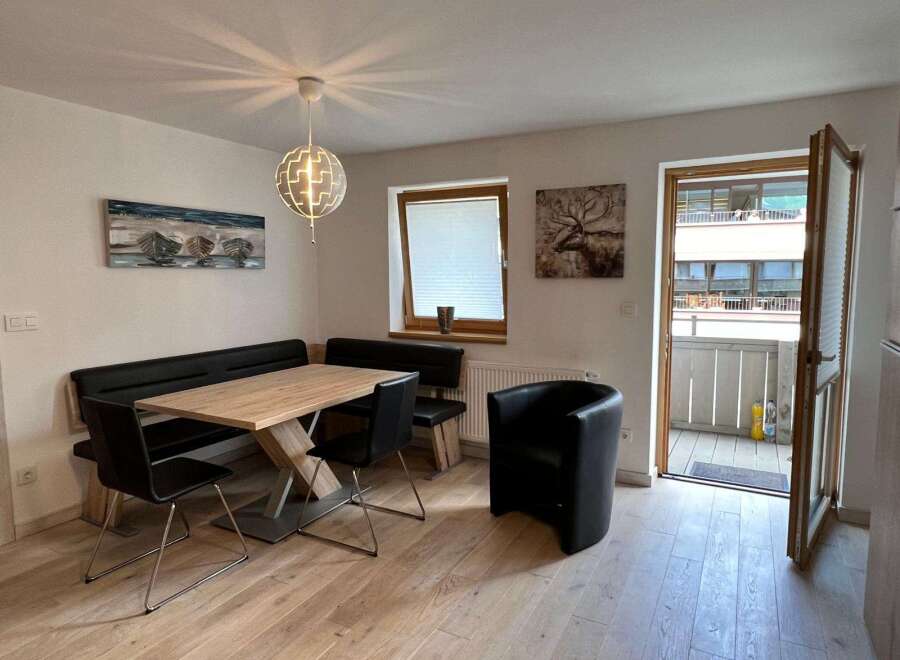 This charming property boasts a bright and airy dining area, perfect for entertaining or enjoying family meals.