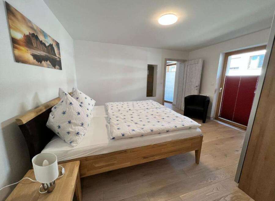 This inviting bedroom features a comfortable bed, perfect for a relaxing stay.