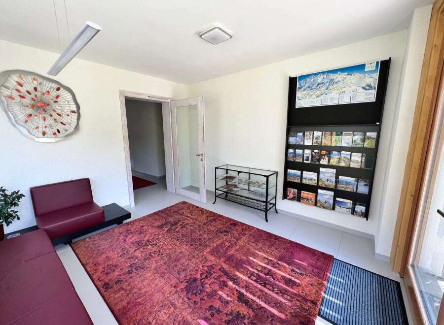 Step into this inviting space, perfect for welcoming guests or creating a comfortable waiting area.