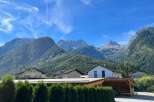 Nestled amidst the breathtaking backdrop of majestic mountains, this property offers a serene escape.