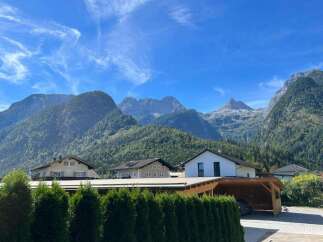 Nestled amidst the breathtaking backdrop of majestic mountains, this property offers a serene escape.