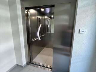 Step into luxury with this modern elevator, a seamless blend of style and functionality.