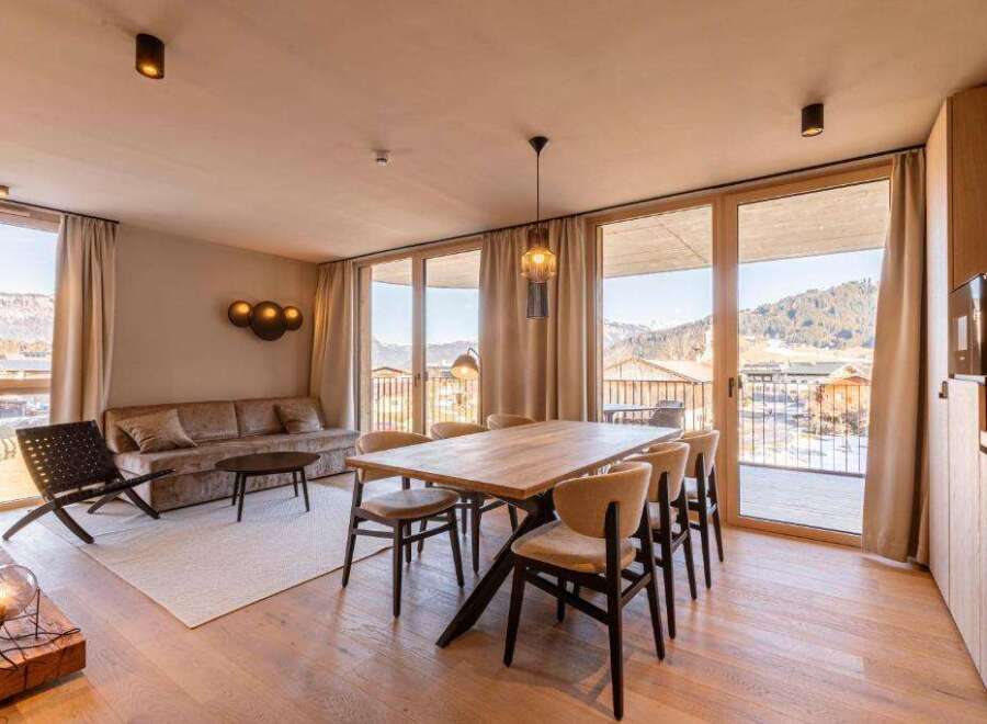 Experience luxury living in this stunning property, featuring a spacious dining area perfect for entertaining.