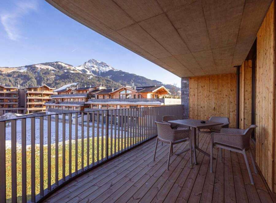 Enjoy breathtaking mountain views from this stunning balcony.
