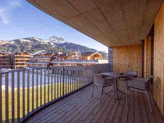 Enjoy breathtaking mountain views from this stunning balcony.