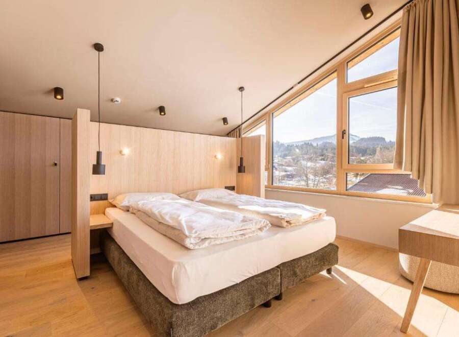 Experience luxury and comfort in this beautifully designed bedroom.