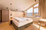 Experience luxury and comfort in this beautifully designed bedroom.