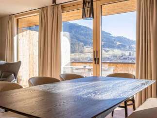 Experience breathtaking mountain views from this stunning property.
