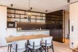 Experience modern luxury in this stunning kitchen and dining area.