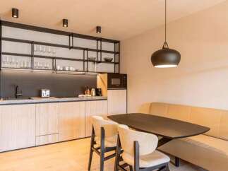 Discover modern living in this stylish property! Featuring a sleek kitchen with ample storage and a cozy dining area, perfect for entertaining.