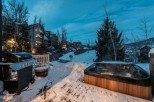 Luxury mountain getaway with private hot tub and deck.