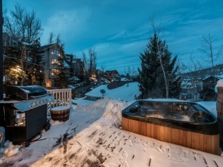 Luxury mountain getaway with private hot tub and deck.