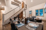 This stunning modern home boasts an open floor plan, perfect for entertaining.