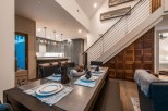 This stunning home boasts a spacious open-concept layout, seamlessly blending the kitchen and dining area.