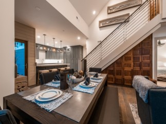 This stunning home boasts a spacious open-concept layout, seamlessly blending the kitchen and dining area.