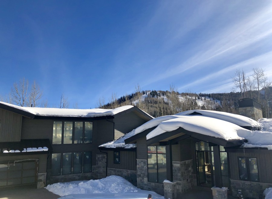 Luxury mountain home with stunning views and modern design.