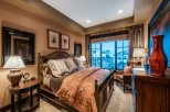 Luxurious mountain getaway boasting stunning views and a spacious master bedroom.
