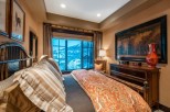 Luxurious bedroom with stunning mountain views.