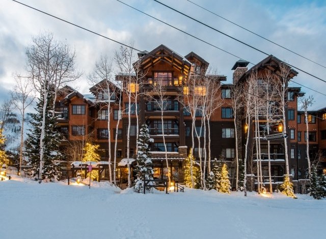 Luxury ski-in/ski-out resort nestled in the mountains.