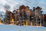 Luxury ski-in/ski-out resort nestled in the mountains.