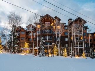 Luxury ski-in/ski-out resort nestled in the mountains.