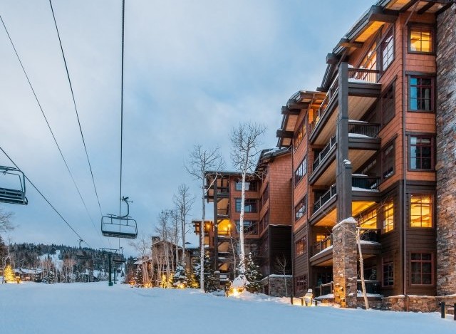 Luxury ski-in/ski-out condos offer breathtaking mountain views and easy access to slopes.