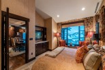 Luxurious mountain retreat boasting stunning views and a spacious master suite.