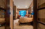 Luxurious mountain getaway boasting stunning views and a spacious master suite.