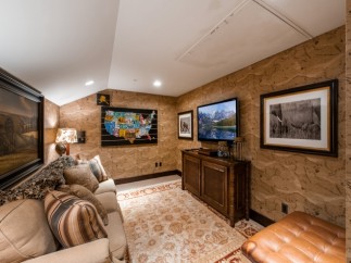 Cozy mountain getaway with a dedicated media room.