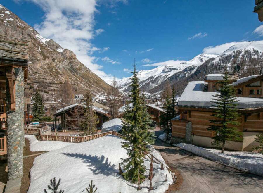 Nestled in a picturesque mountain setting, this stunning property offers a luxurious retreat.