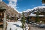 Nestled in a picturesque mountain setting, this stunning property offers a luxurious retreat.