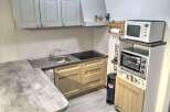 Discover this charming kitchen, perfect for culinary enthusiasts.