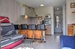 Discover this charming property featuring a well-equipped kitchen with modern appliances and a cozy living area.