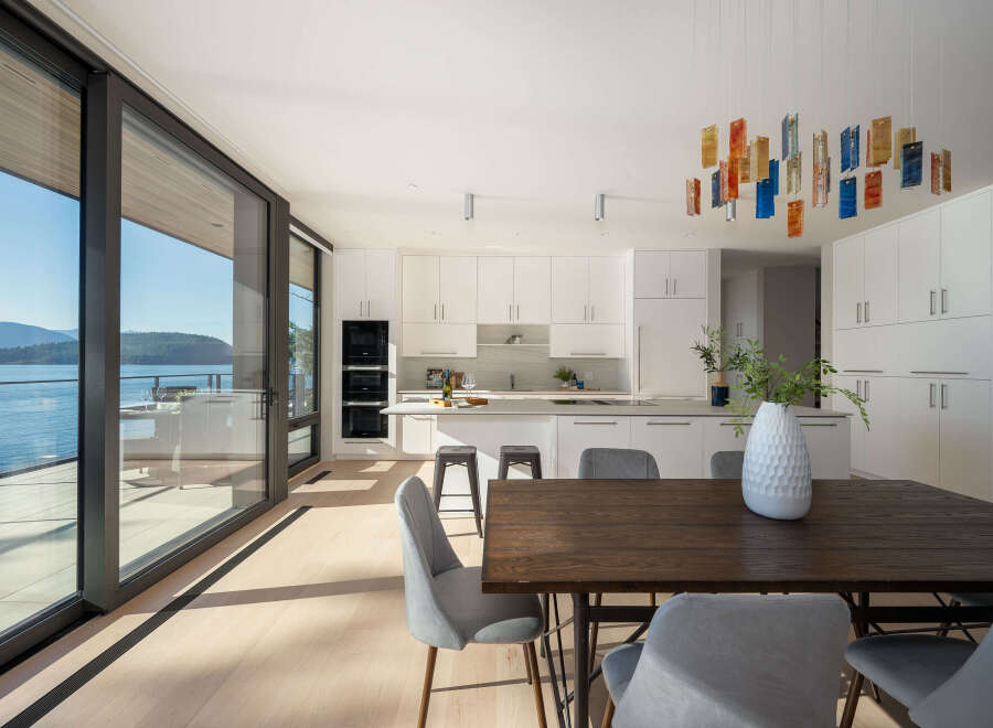 Experience luxury living in this stunning modern home with breathtaking water views.