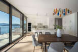 Experience luxury living in this stunning modern home with breathtaking water views.