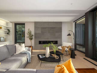 Experience modern luxury in this stunning living room.