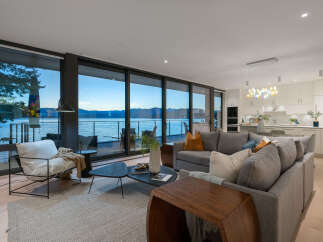 Experience luxury living with this stunning property boasting panoramic water views.