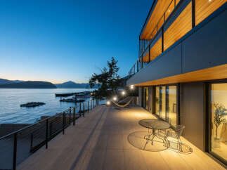 Experience waterfront living at its finest in this stunning modern home.