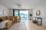 Experience luxury living with this stunning property featuring a spacious living room and breathtaking ocean views.