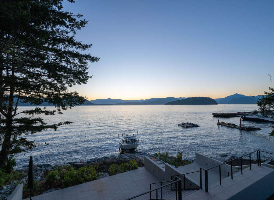Experience waterfront living at its finest with this stunning property.