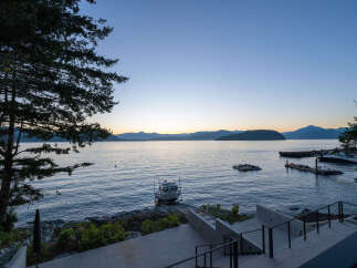 Experience waterfront living at its finest with this stunning property.