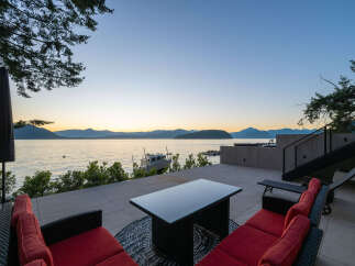 Experience waterfront living at its finest with this stunning property.