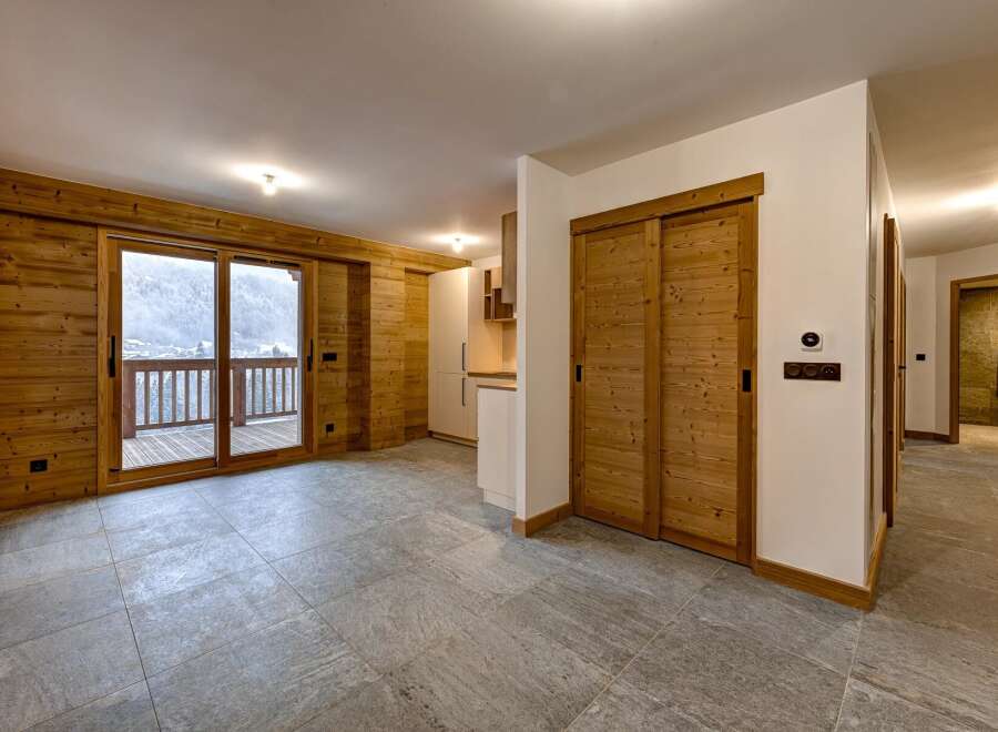 Step into this stunning property featuring a seamless blend of natural wood and modern design.