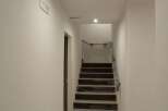 Discover this stunning property featuring a modern staircase leading to the upper levels.