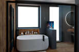 Experience luxury in this modern bathroom, featuring a sleek, freestanding bathtub and a stylish TV for ultimate relaxation.