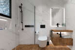 Experience modern luxury in this stunning bathroom.
